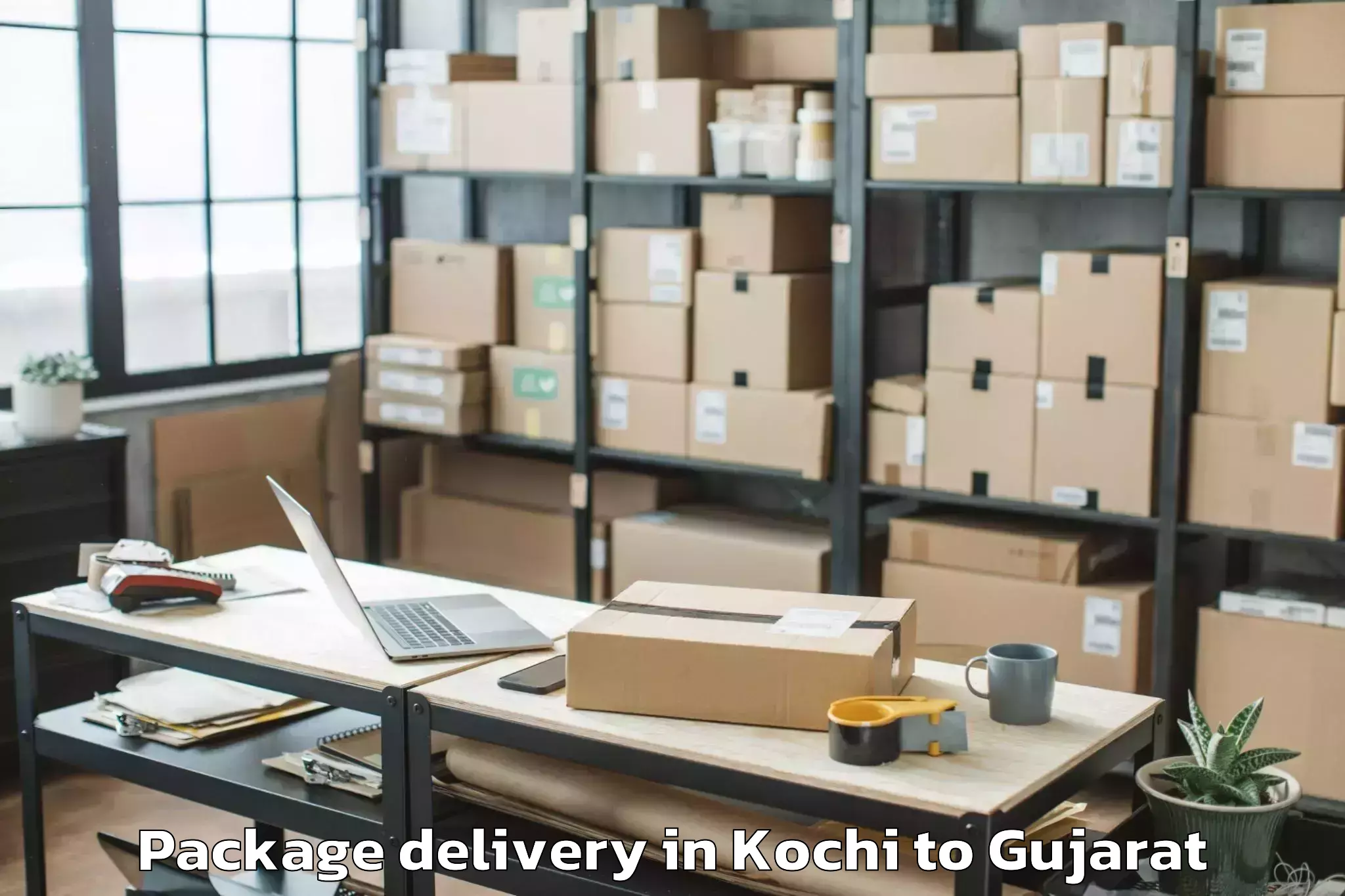 Book Kochi to Jhagadia Package Delivery Online